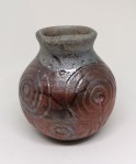 small raku vase with ancient petroglyph design. 7.5 x7cm. £19